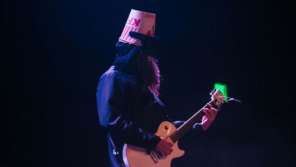 Buckethead playing guitar