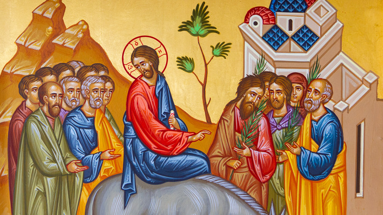 Jesus on a donkey entering Jerusalem