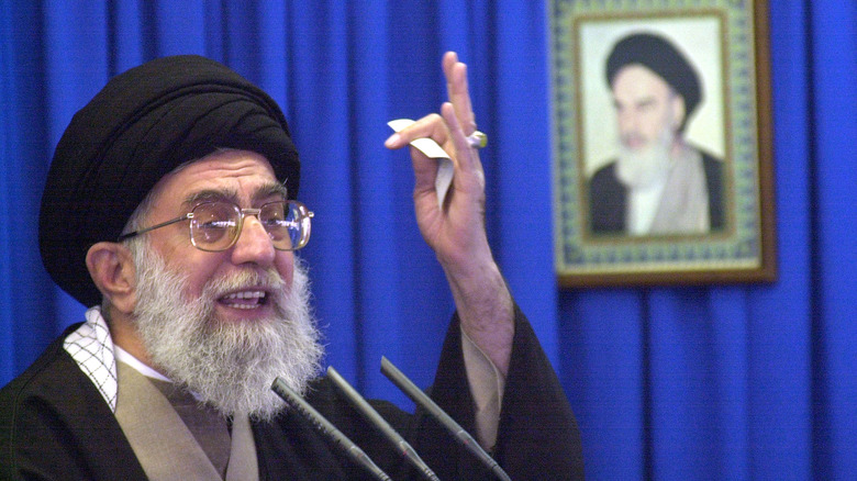 Ayatollah Ali Khamenei speech microphones portrait