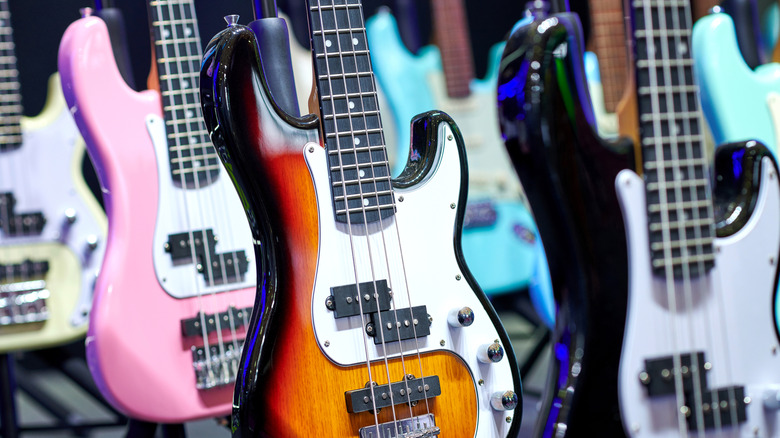 Row of Fender basses on display