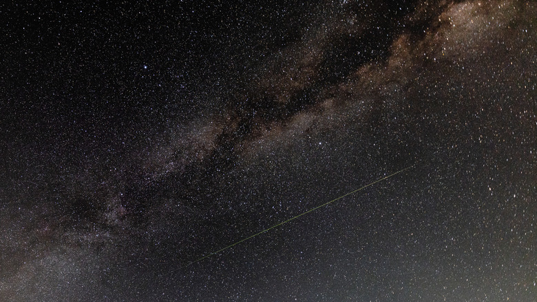 Meteor passes under Milky Way