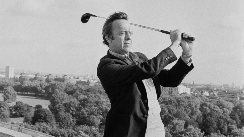 Alan Shepard golfing