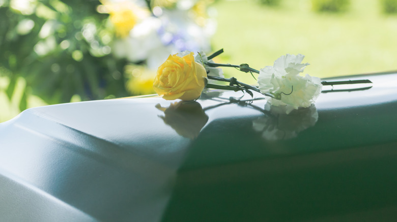 yellow flowers funeral casket