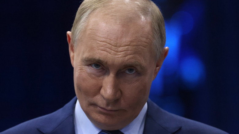 Close up of Vladmir Putin looking sinister