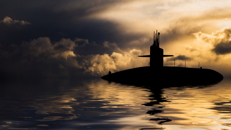 Submarine surfacing in ocean