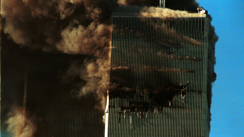 smoke pouring from towers