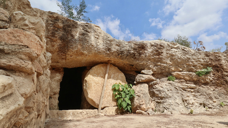 Open rock tomb circular door