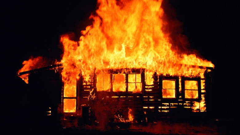 Wooden house on fire