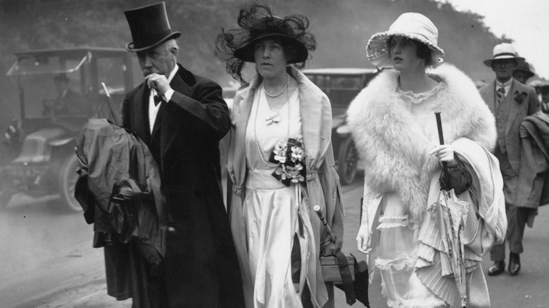 A well-dressed man and women from the 1920s