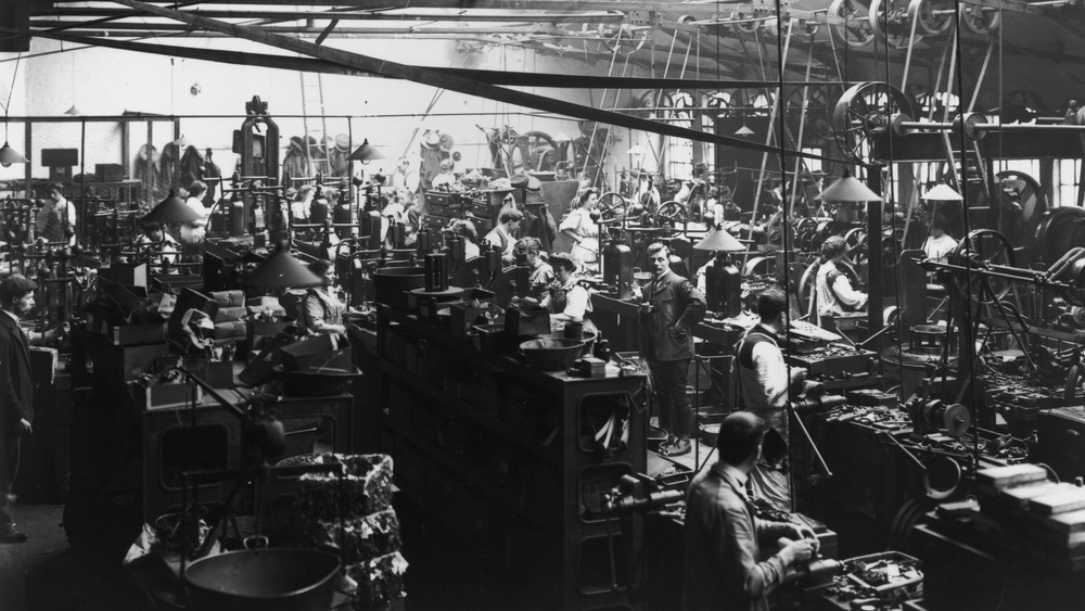 Workers in a button factory packaging the finished product