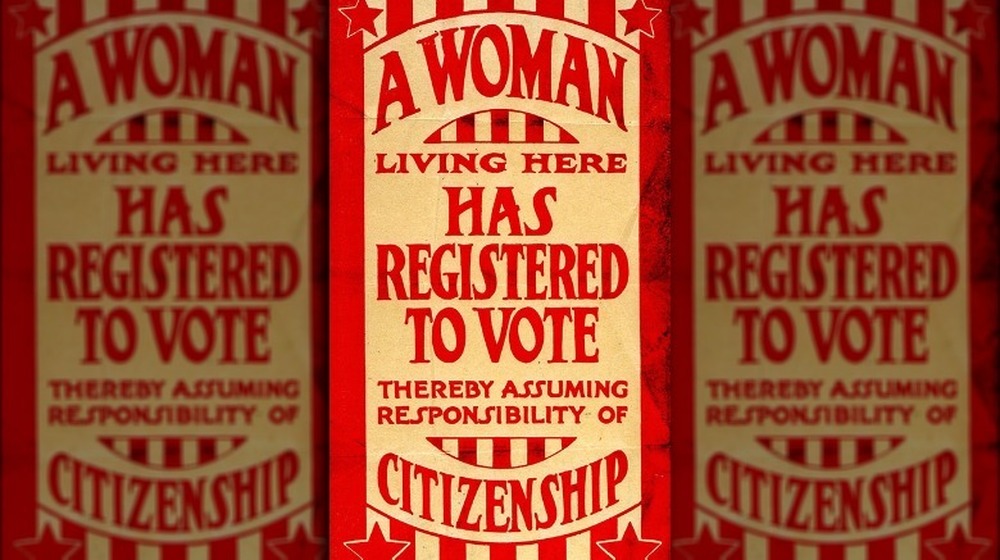 "A Woman Living Here Has Registered to Vote" sign
