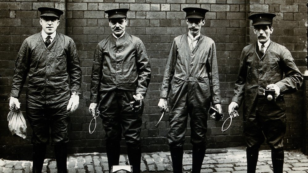 Professional rat-catchers lining up with the tools of their trade, Liverpool, England