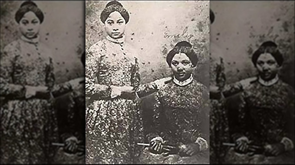 Freed sisters Mary and Emily Edmonson, standing