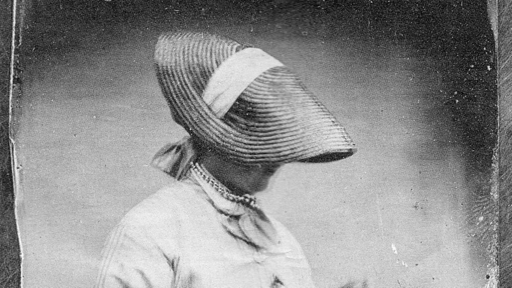 Marian "Clover" Adams, wearing hat 