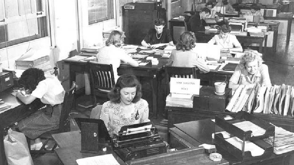 Cropped photo of women working at SIS