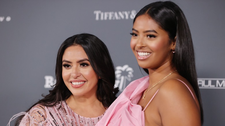 Vanessa Bryant (left) and Natalia Bryant smiling