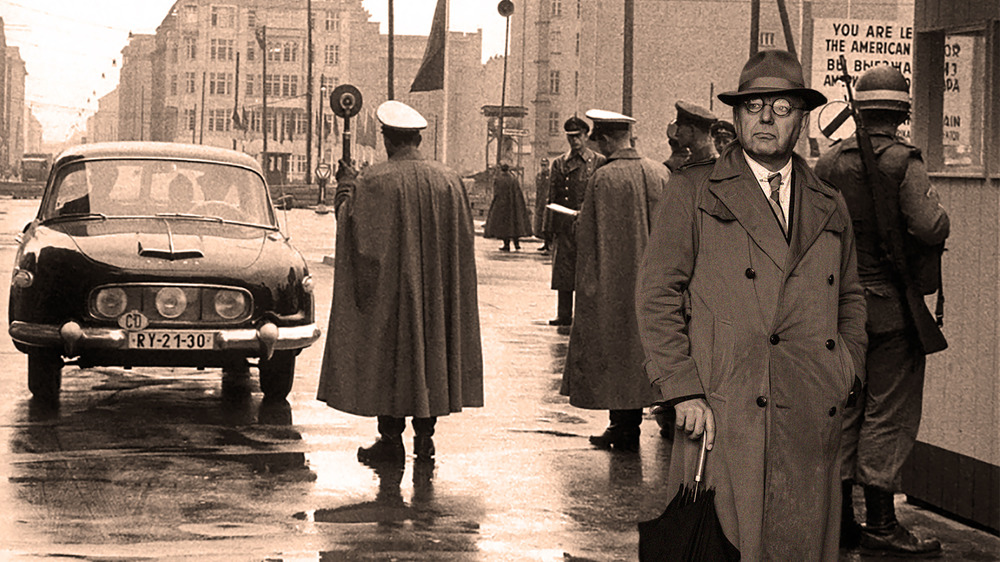 photo showing men standing at checkpoint in Berlin