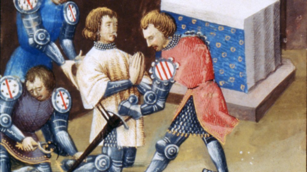 Knight being dubbed