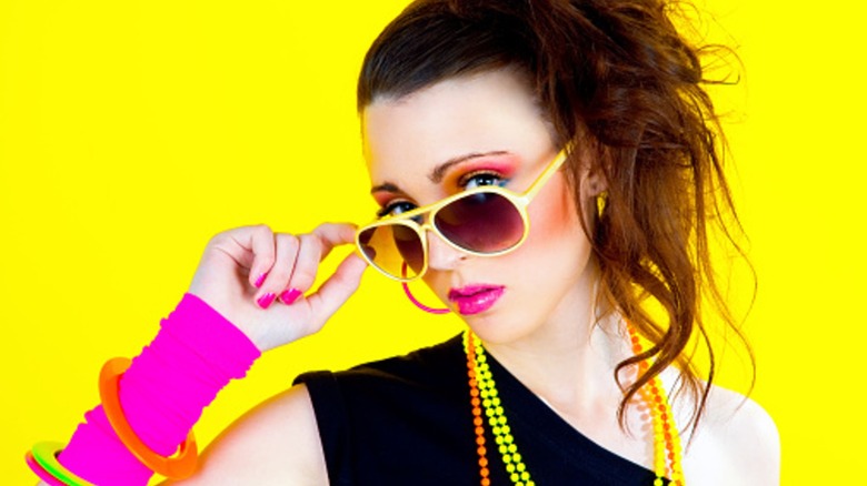 1980s valley girl in bright jewelry