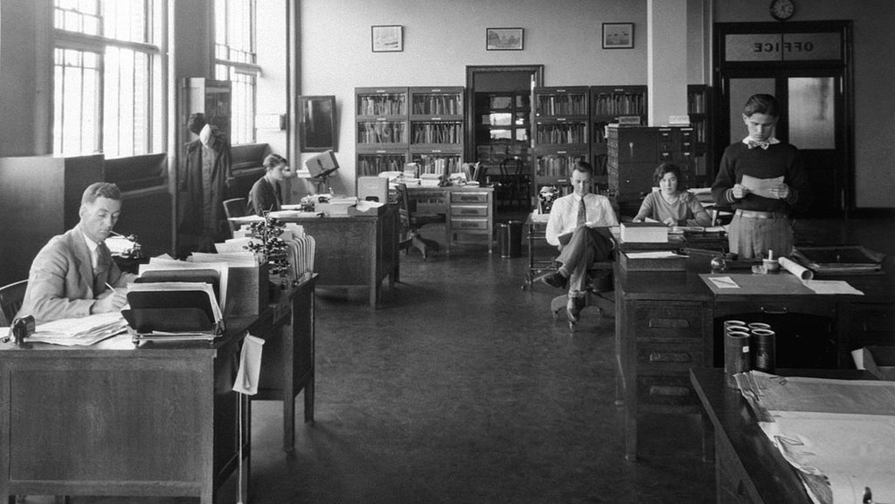 NACA office with people at desks