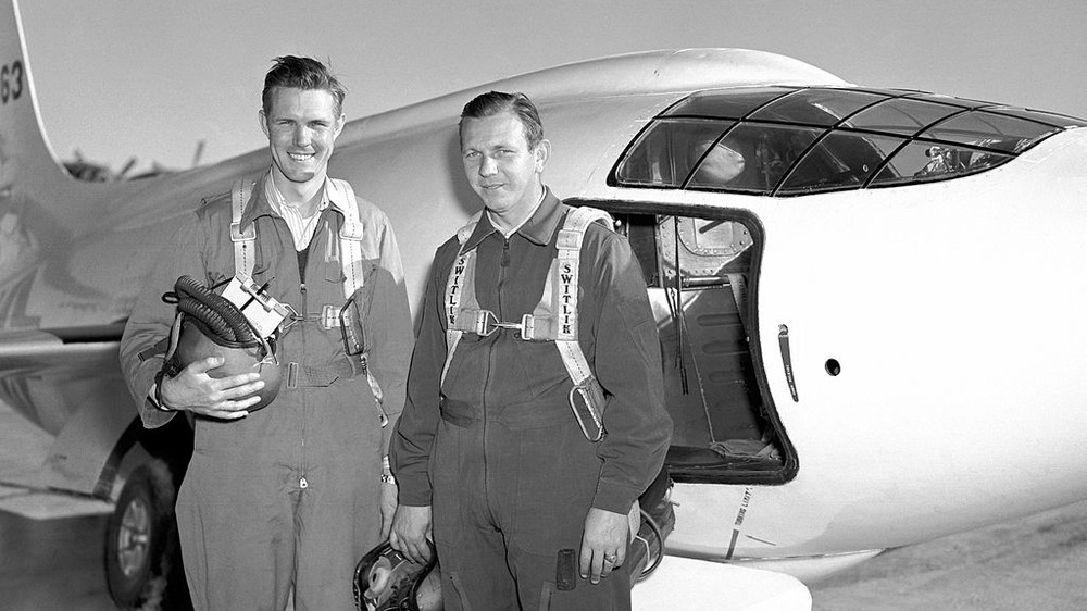 herbert hoover and robert champine in front of plane