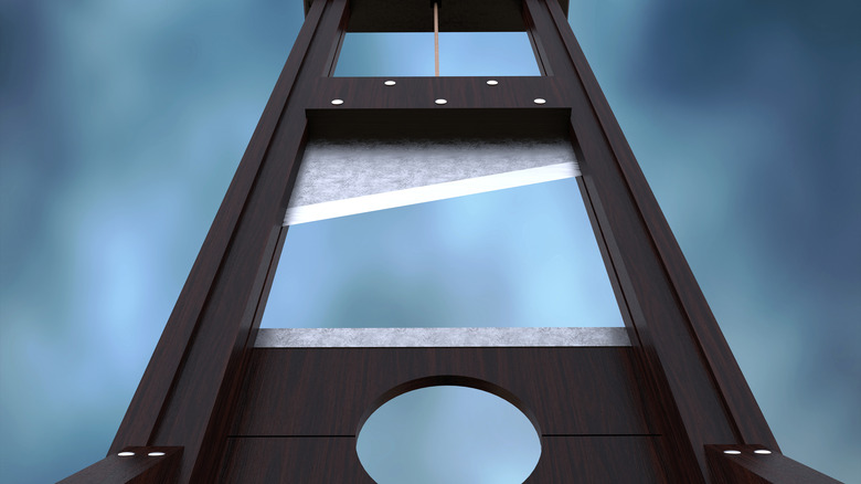 Guillotine with cloudy background