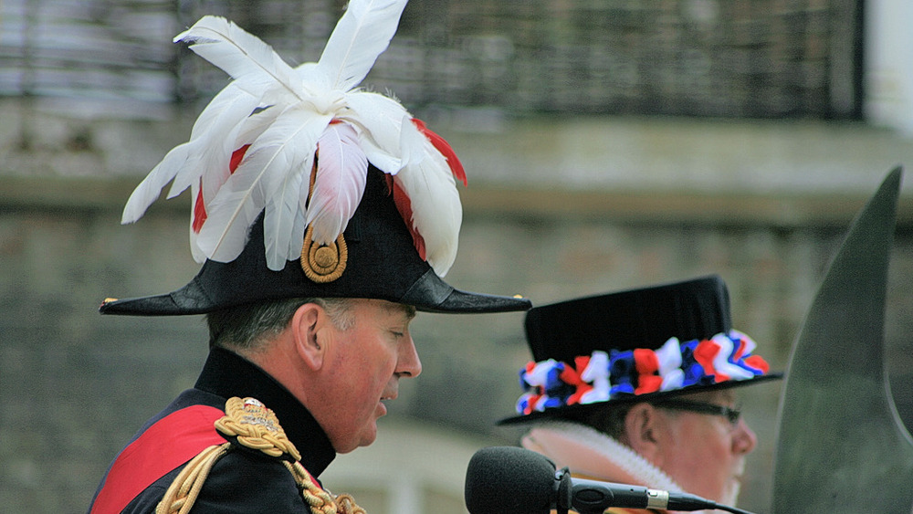 constable of the tower wearing plumed hat
