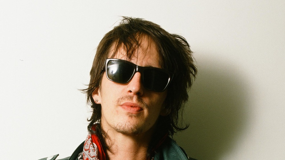 Izzy Stradlin wearing sunglasses