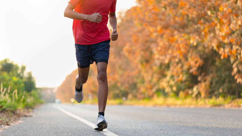 Man jogging on road