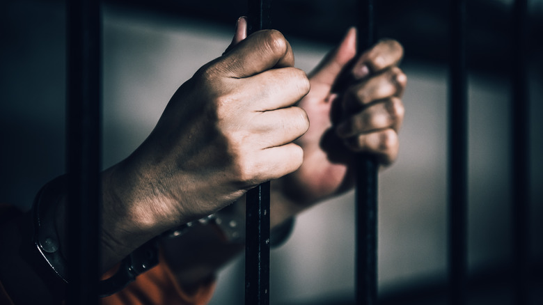 Man in prison cell