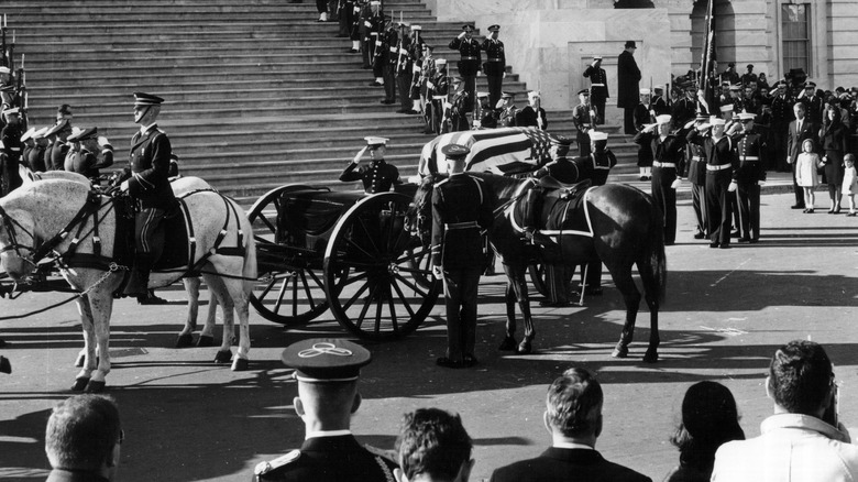 John F. Kennedy's funeral procession saluting his casket