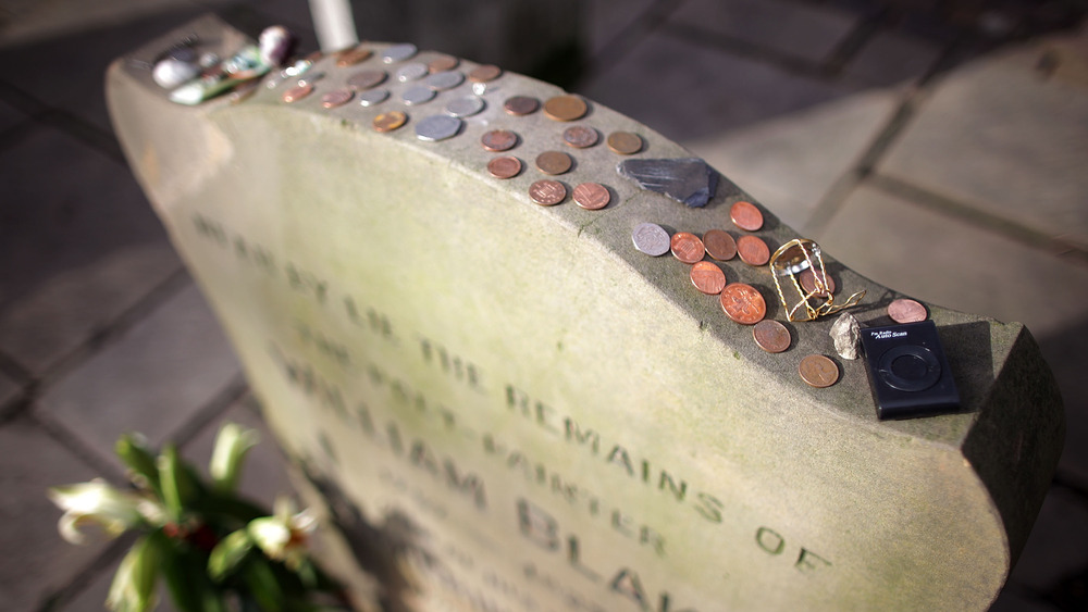 Coins on a headstone