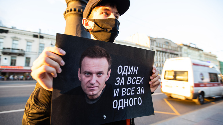 Russian protester with poster