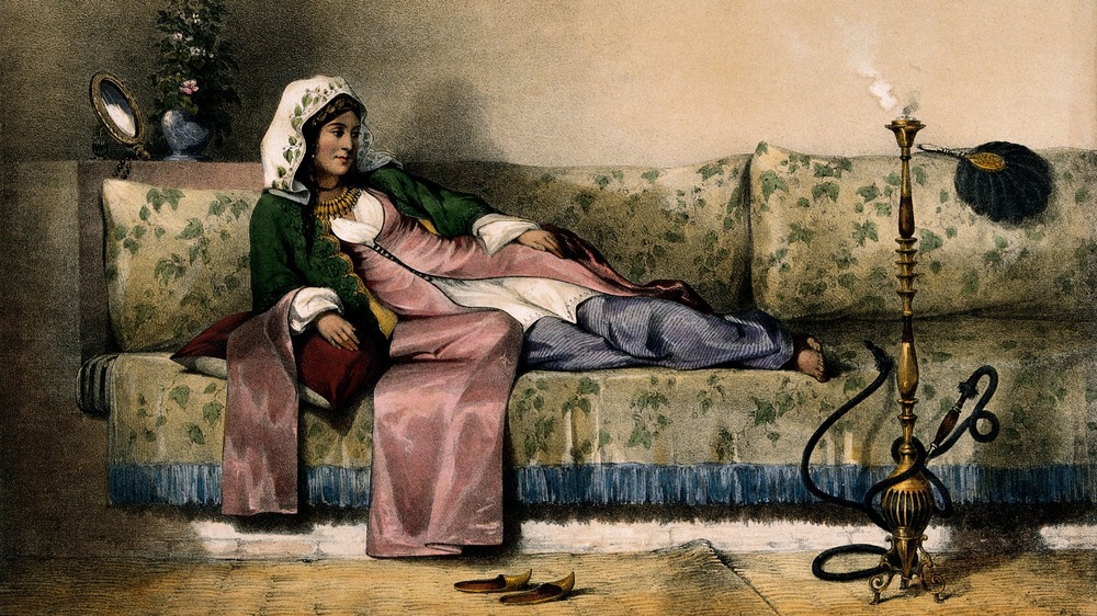 A Muslim lady reclining in her harem