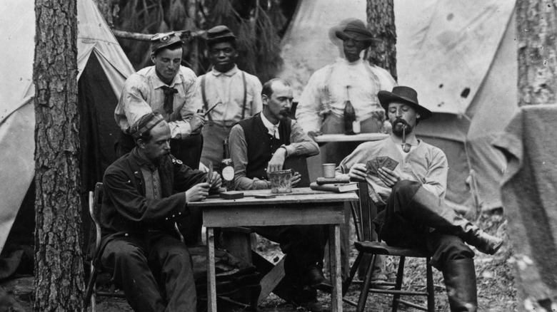 soldiers at table playing cards