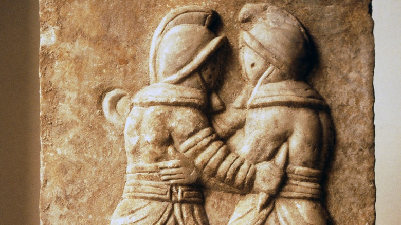 roman relief gladiators fighting