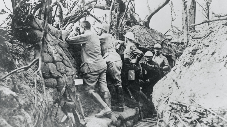 Soldiers keeping watch in trench