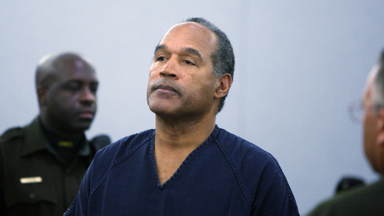 OJ Simpson in court in blue jumpsuit