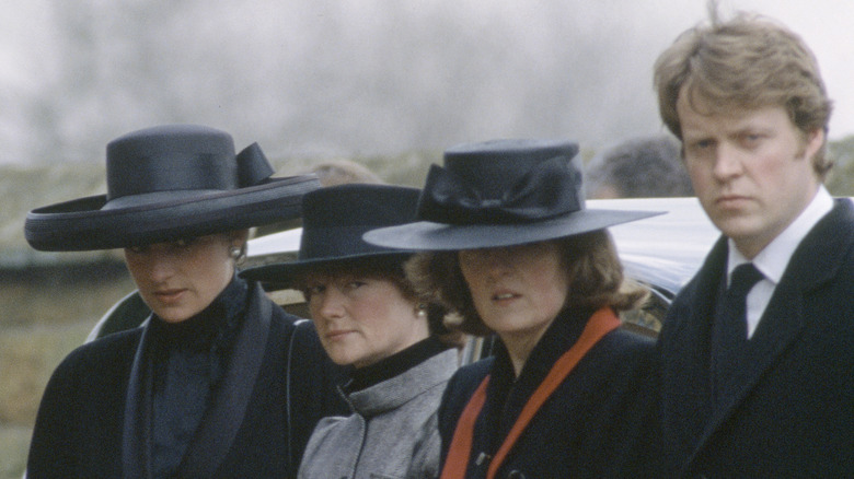 Princess Diana  two sister and brother all in black