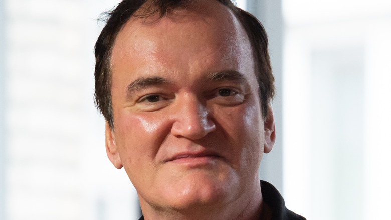 Quentin Tarantino looking at camera