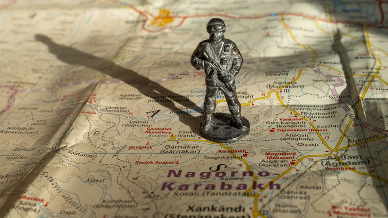 Soldier on map of Nagorno-Karabakh