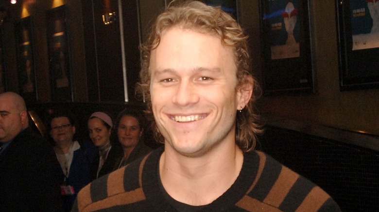 heath ledger smiling striped sweater