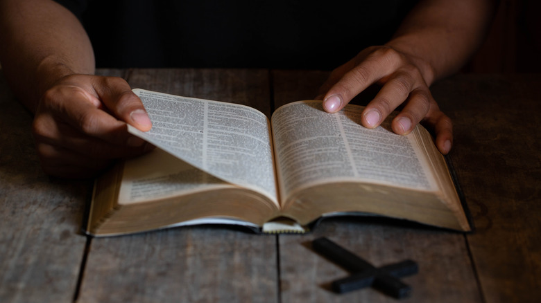 Person reading a Bible