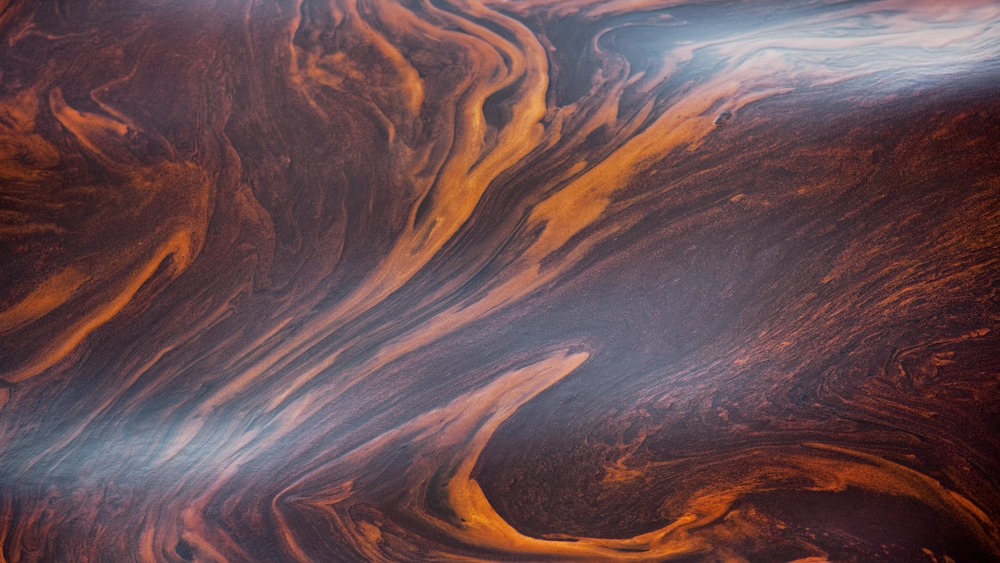 Tendrils of crude oil cover the waters of the Gulf of Mexico following the explosive sinking of the BP operated Deepwater Horizon oil drilling rig on April 26 2010.