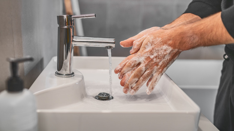 washing hands with soap