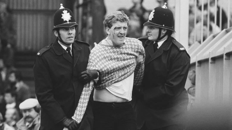 Football fan ejected by police 1985