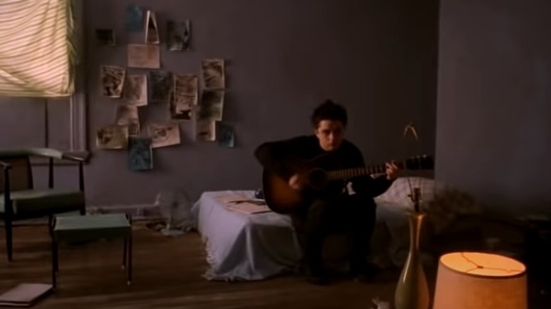 Billie Joe Armstrong playing guitar