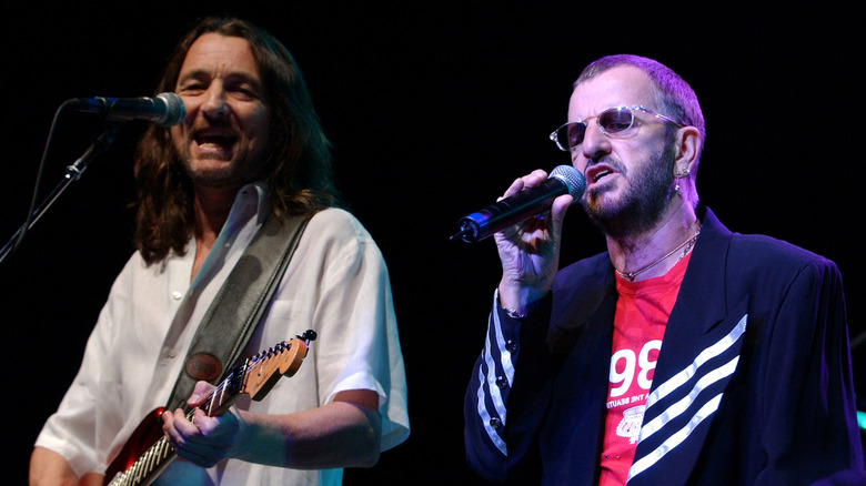 Roger Hodgson performing onstage with Ringo Starr