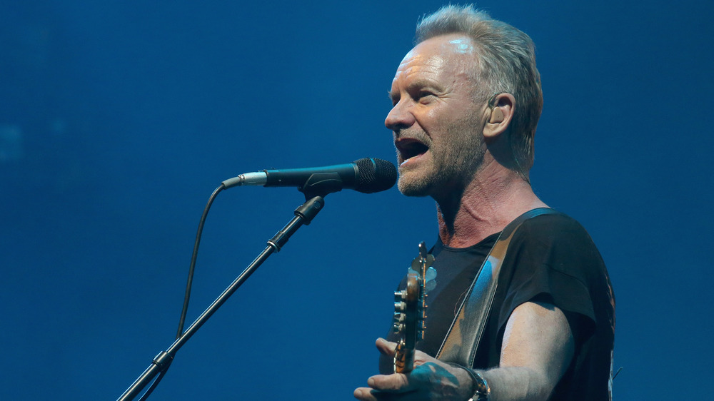 Sting performing onstage