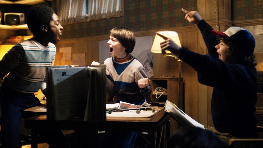 The kids playing D&D.